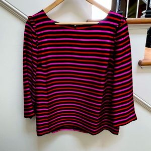 Satiny soft blouse in bright red, pink and black. Size 10p